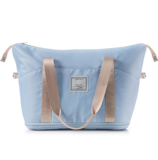 4-Piece Expandable ABS Luggage Set with Travel Bag, Light Blue